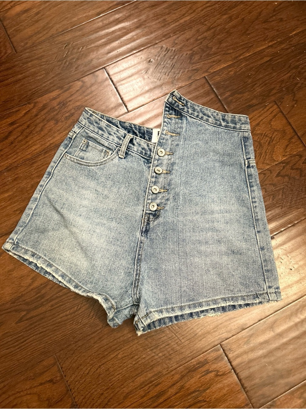 High-Waisted Light Blue Denim bum Shorts with Button Front